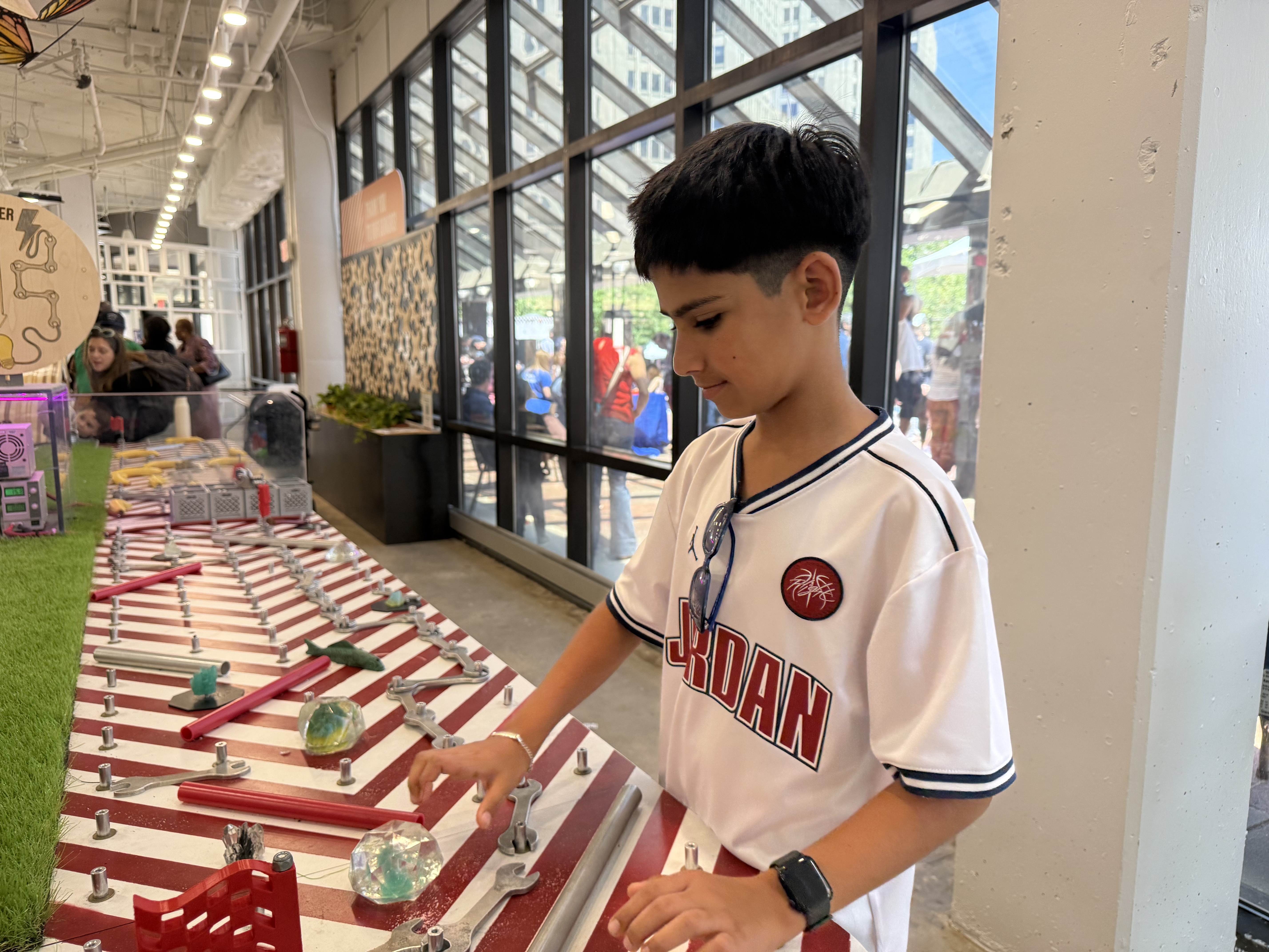 Focused kid at STEM station