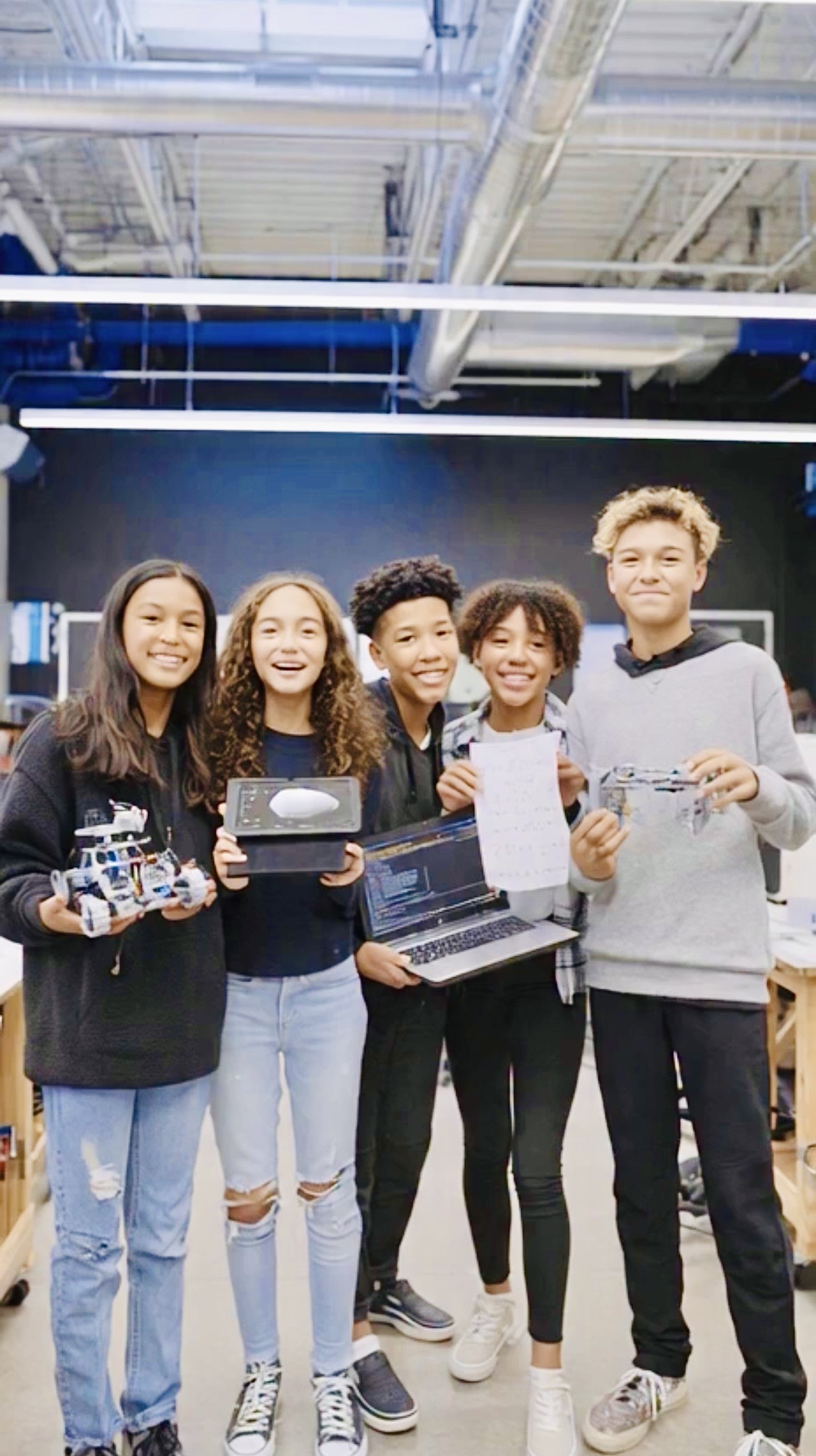 Students with robots, apps and projects